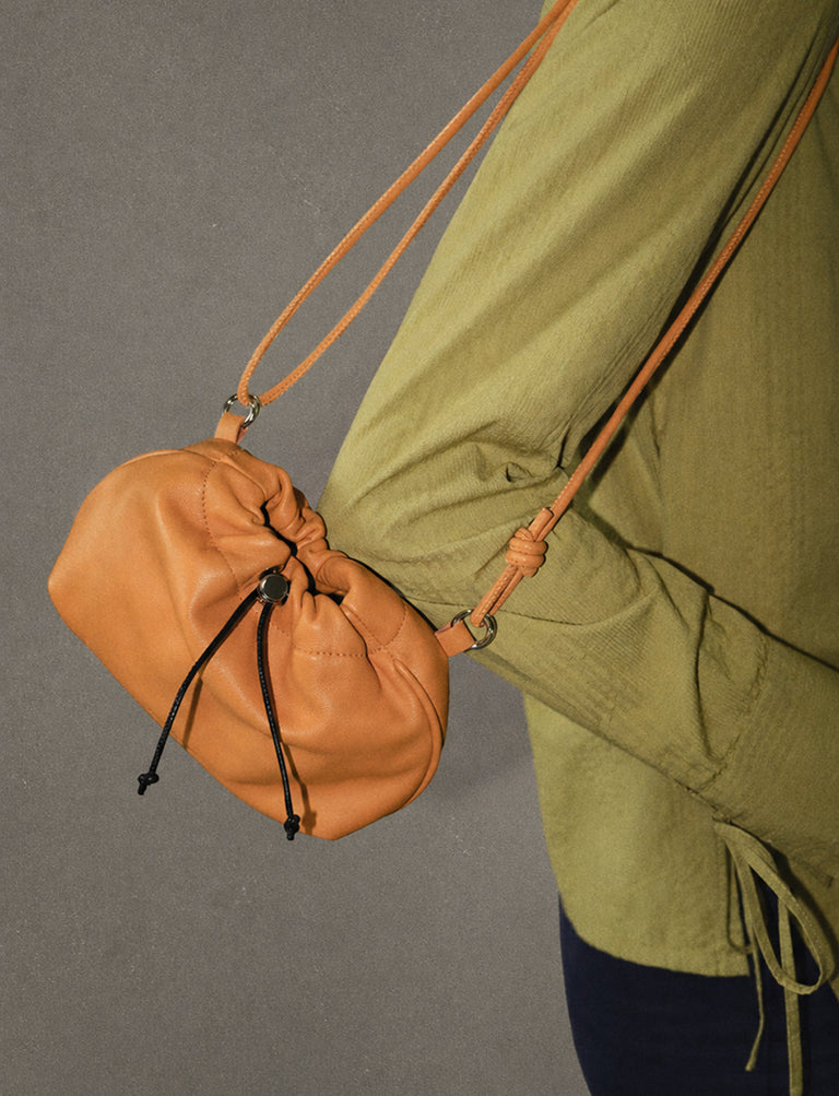 Bolso magnesera naranja piel Grip sostenible silueta - CAMPAÑA