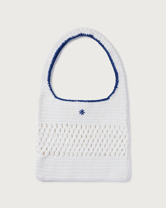 White handbag handwoven with crochet